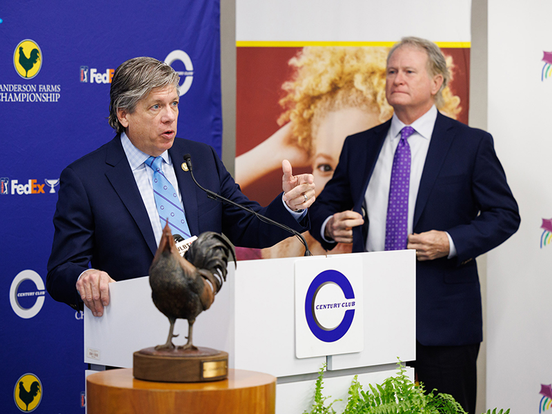 Sanderson Farms Championship Executive Director Steve Jent speaks during the announcement of Century Club Charities' gift to Friends of Children's Hospital as Johnny Lang, Century Club Charities treasurer, looks on.